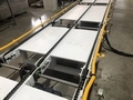 Convoyeur à plaques à chaîne