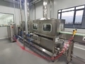 Laveuse de boîtes pleines