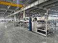 Chargeur et déchargeur de caisses d'autoclave