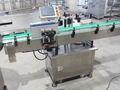 Machines d'étiquetage enveloppantes